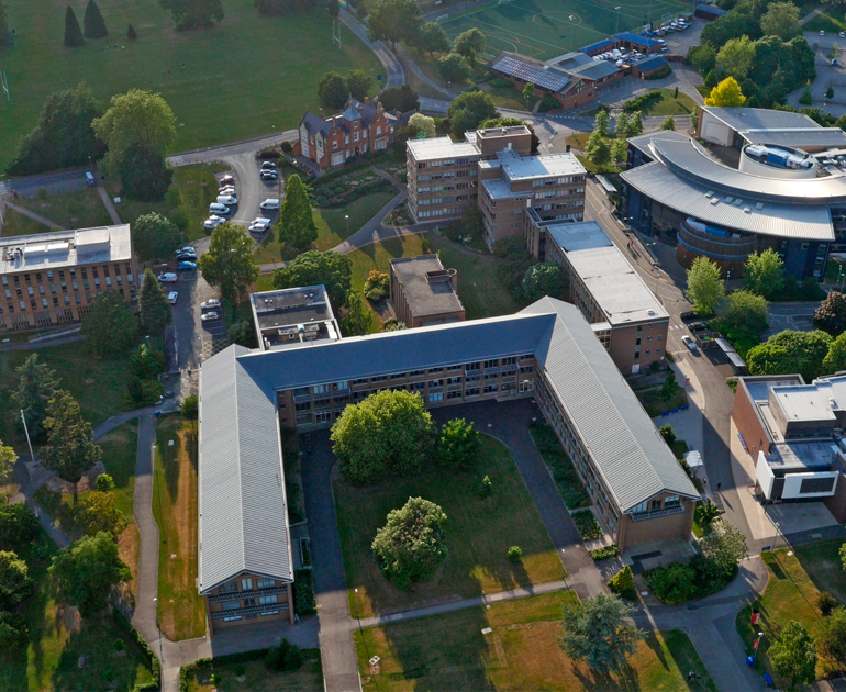 Whiteknights campus from the air: Edith Morley, Minghella, Whiteknights House, Henley Business School and Old Whiteknights House. Still image taken from 4K drone footage. Summer 2015.