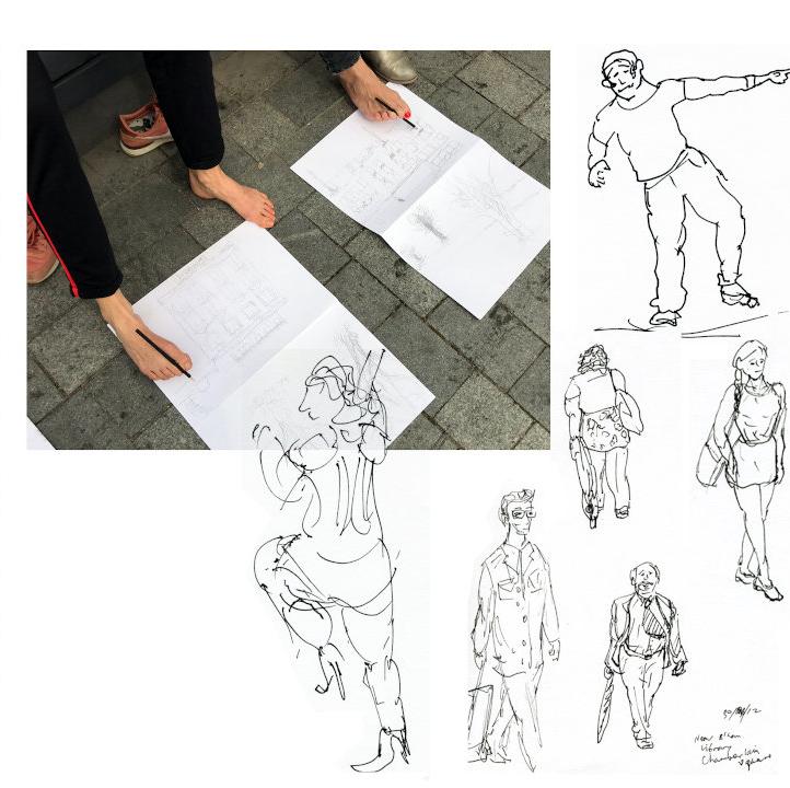Two people drawing with their feet and six sketched figures in a variety of poses