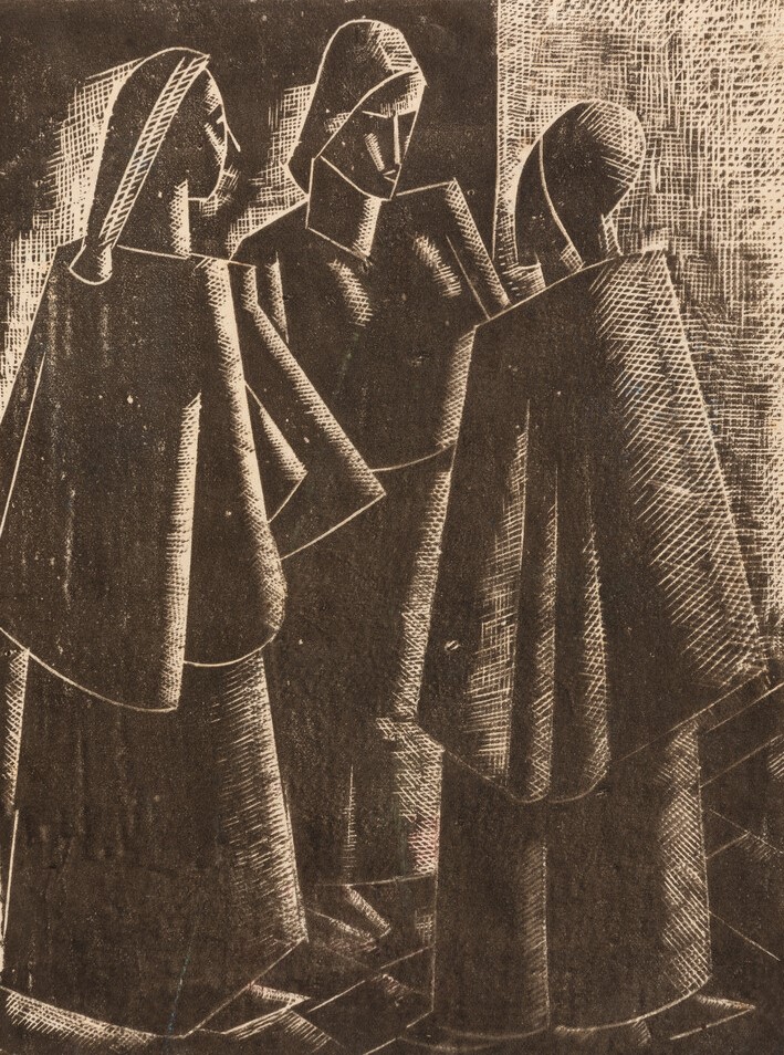 Group of three women gathering in a circle, in an alley