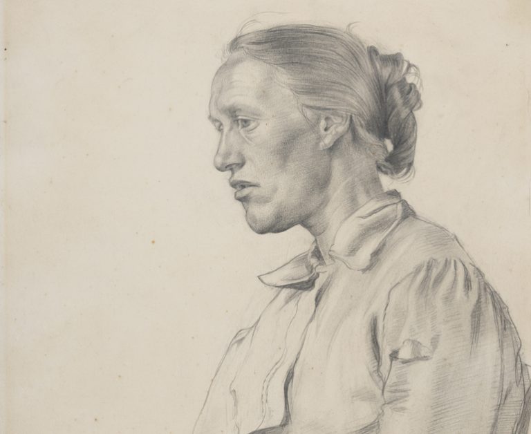 Closeup of a portrait of a woman in profile, facing directly to the left with her head tilted slightly downwards.