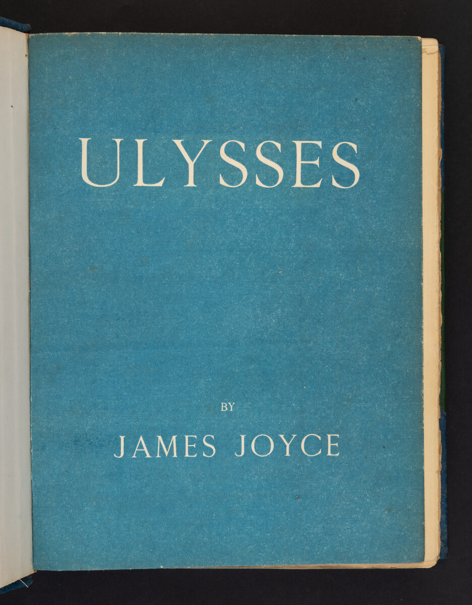 Title Ulysses by James Joyce printed in capital letters on a faded blue background