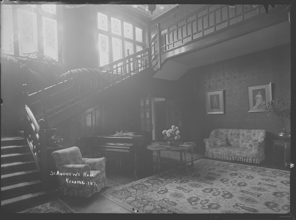 Black and white photograph of the staircase hall at St Andrews when it was used as a sitting room (1880-1939)