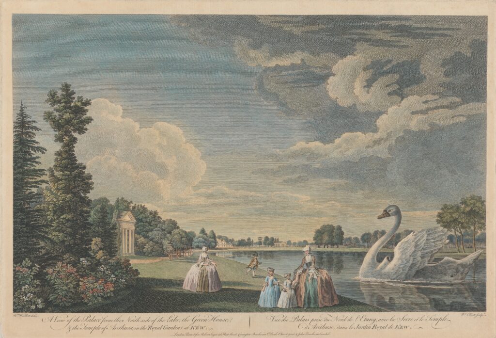 image of lake with swan boat and visitors