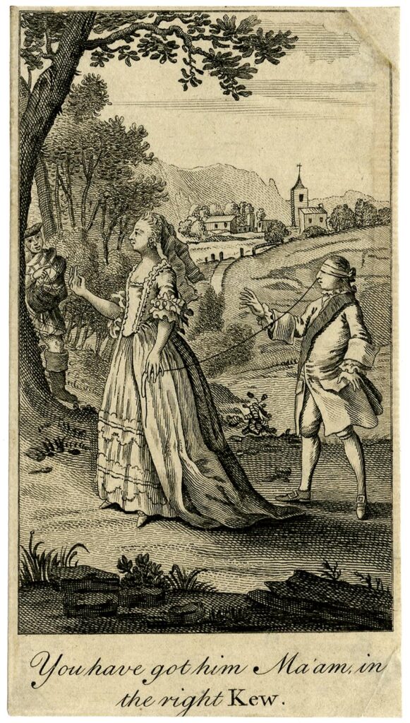 image of a woman leading a blindfolded man