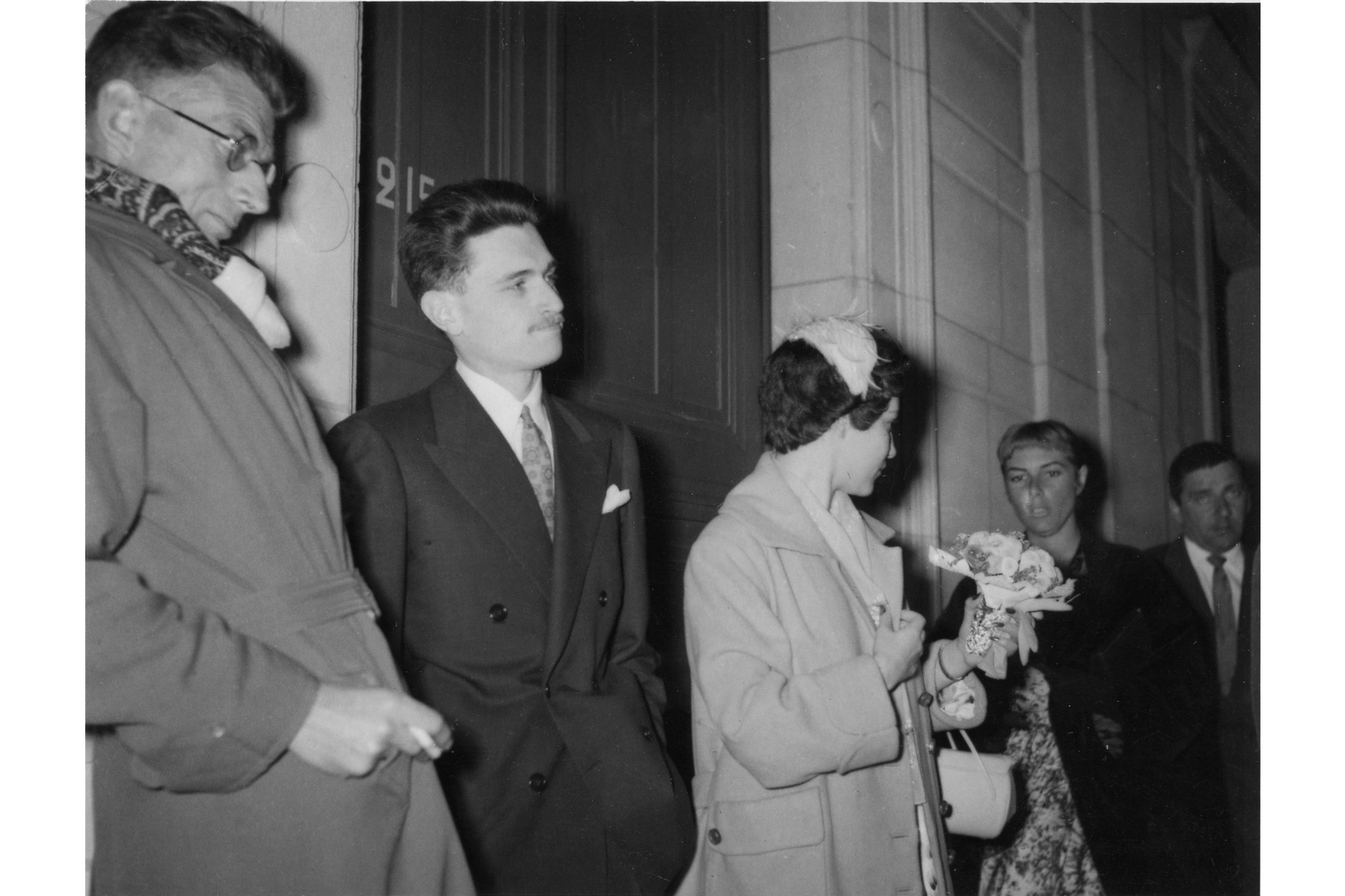 Photograph of Solange and Stephen James Joyce at their wedding, with Samuel Beckett (who was the Best Man) in the foreground, Image © Sean Sweeney, reproduced with his kind permission