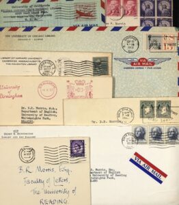 A pile of letters from the late 1950s showing colourful designs and stamps