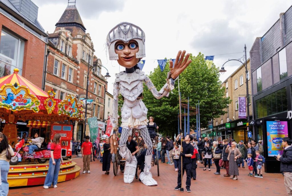 A RAG parade through Reading town centre led by a giant White Knight puppet